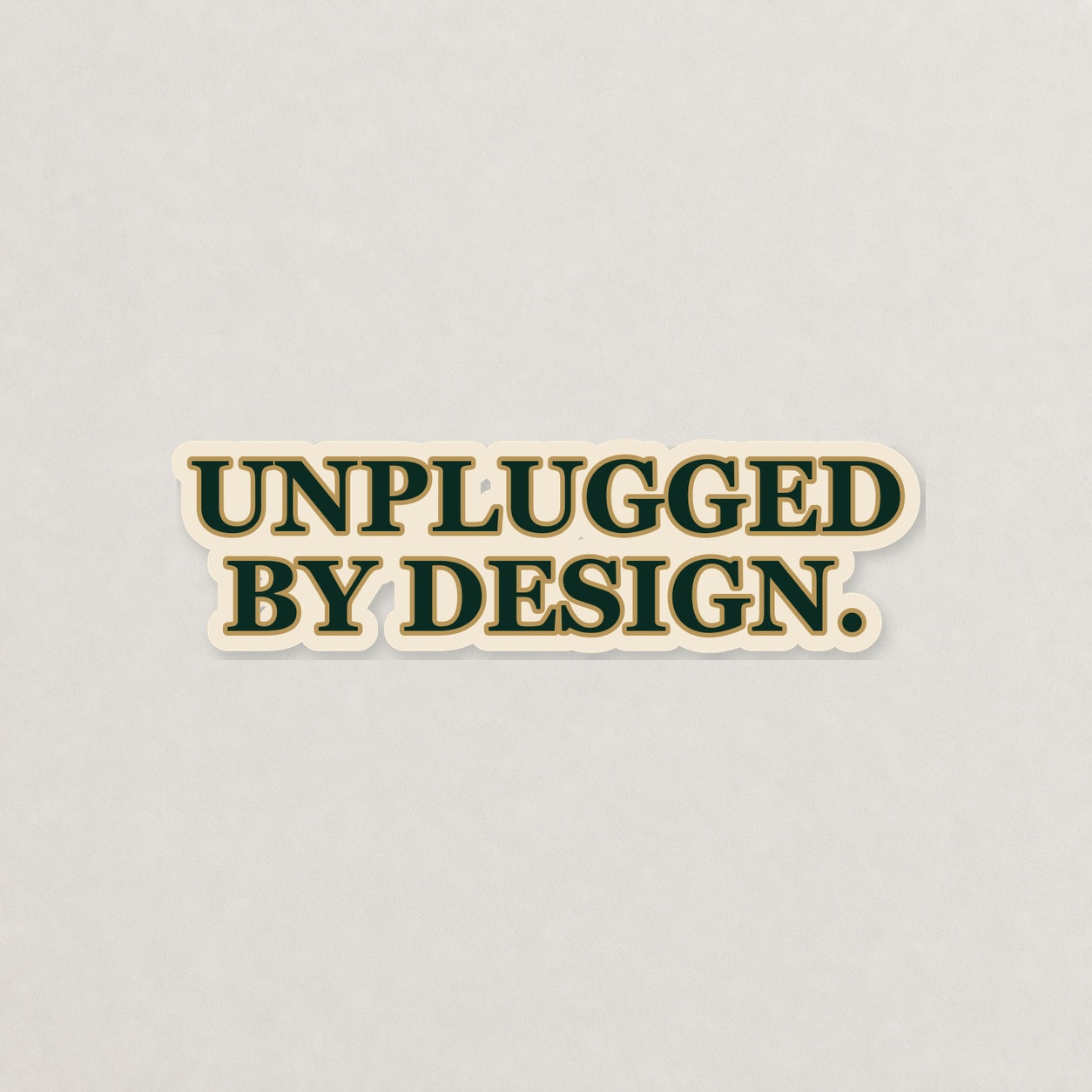 Unplugged by Design Lettering Sticker on a neutral studio background